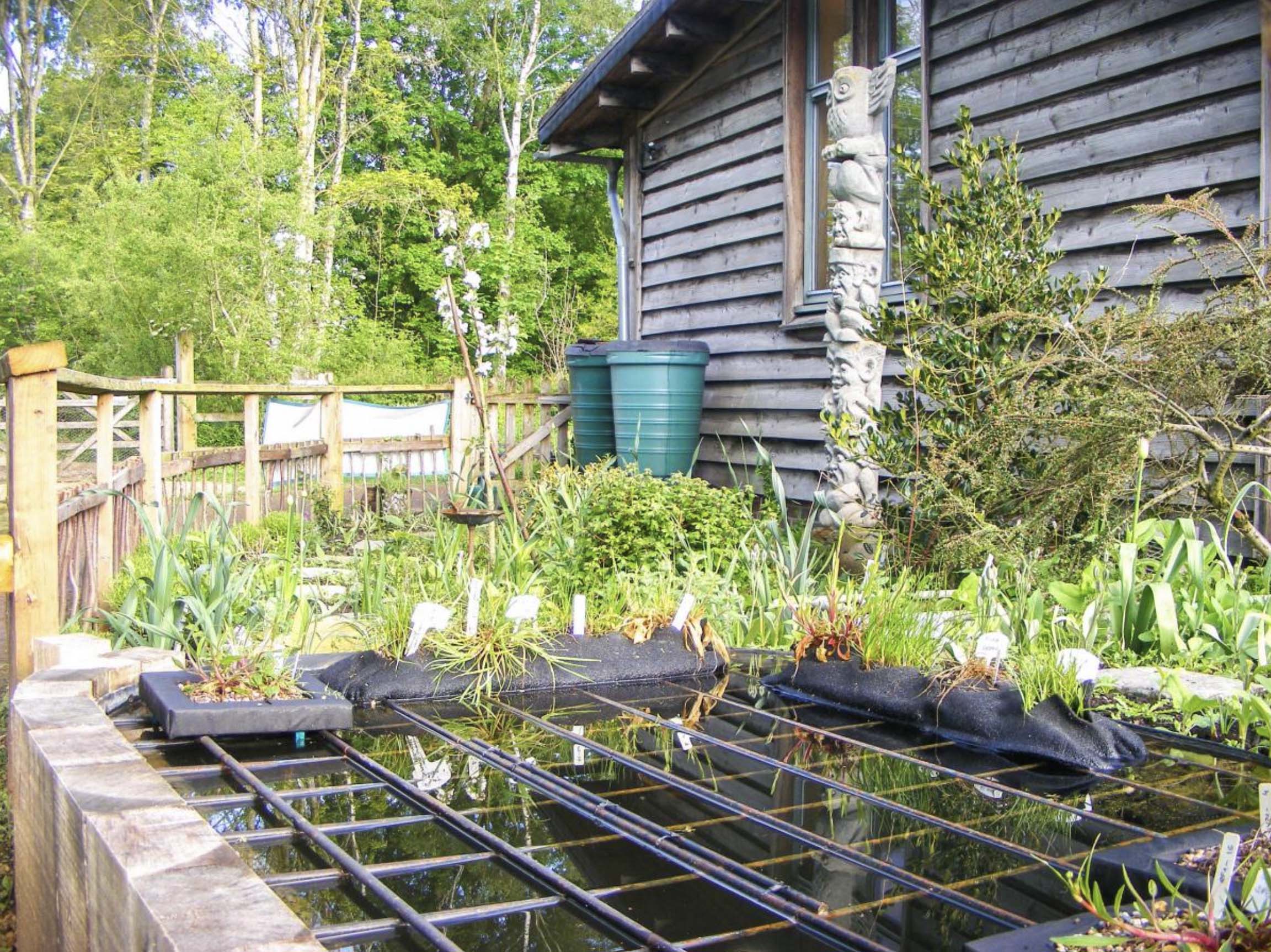 New wildlife education garden design in Oxfordshire for children and adults, wheelchair access using reclaimed bricks and stone. Pond for wildlife.